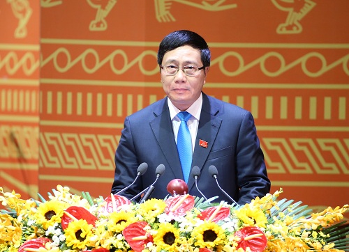 Đồng chí Phạm Bình Minh, Ủy viên Trung ương Đảng, Phó Thủ tướng Chính phủ, Bộ trưởng Bộ Ngoại giao trình bày tham luận tại Đại hội XII. Ảnh: TTXVN